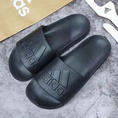 Adilette aqua best sale slides black