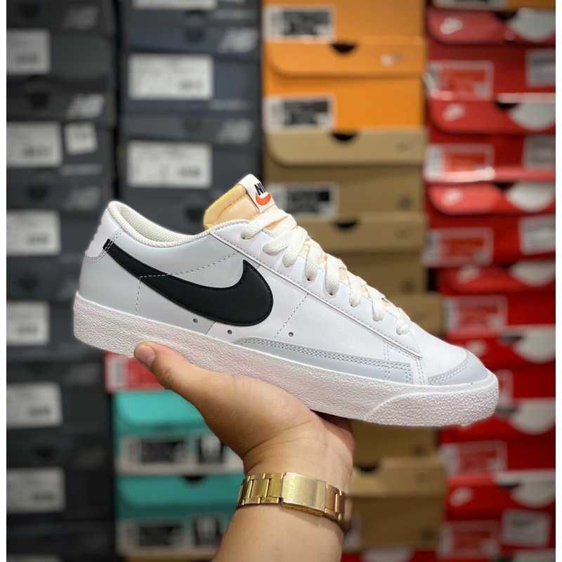 Blazer low hotsell white black swoosh