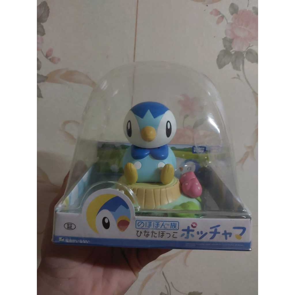 Tomy solar store powered bobble head