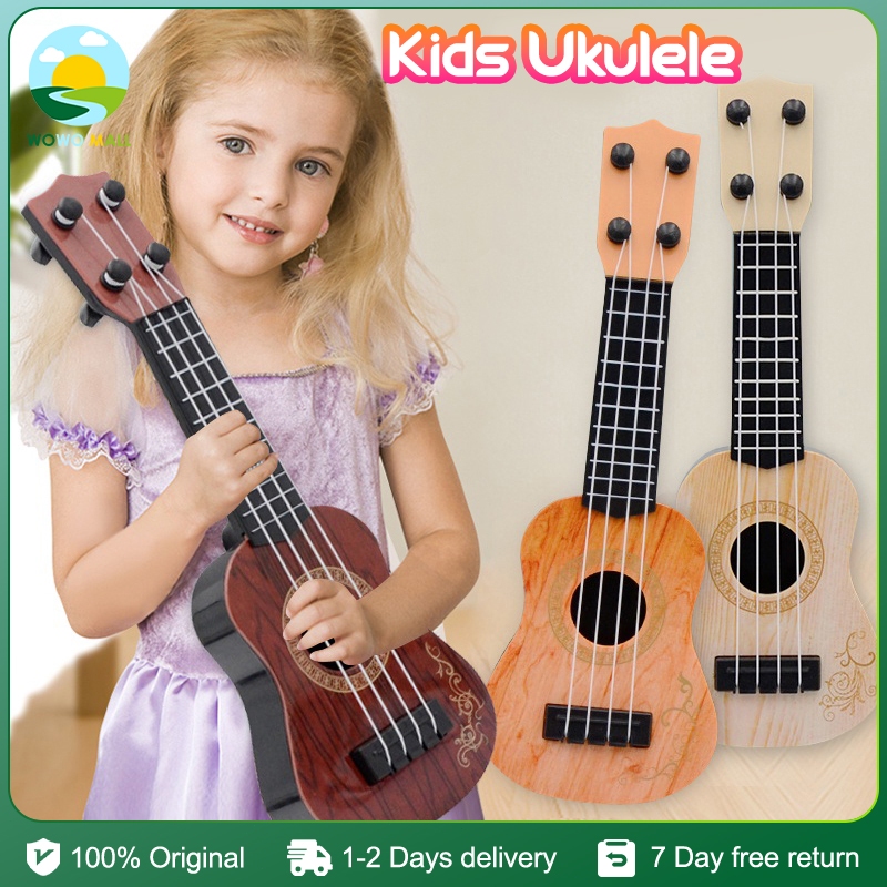 4 string Ukri children s wooden Guitar toy mini portable boy girl birthday gift educational toy New Shopee Philippines
