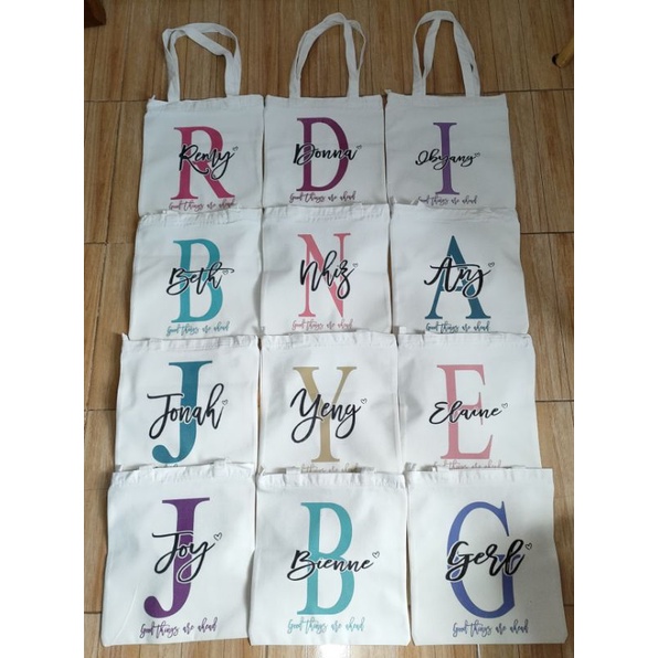 Tote bags with discount names on them